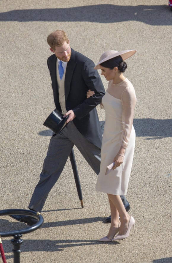 Le prince Harry, duc de Sussex et Meghan Markle, duchesse de Sussex lors de la garden party pour les 70 ans du prince Charles au palais de Buckingham à Londres le 22 mai 2018.
