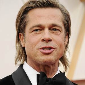 Brad Pitt lors du photocall des arrivées de la 92e cérémonie des Oscars 2019 au Dolby Theatre de Los Angeles. Le 9 février 2020.