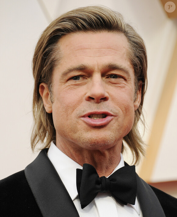 Brad Pitt lors du photocall des arrivées de la 92e cérémonie des Oscars 2019 au Dolby Theatre de Los Angeles. Le 9 février 2020.