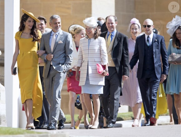 George Clooney et sa femme Amal Alamuddin Clooney, Tom Hardy - Les invités à la sortie de la chapelle St. George au château de Windsor, Royaume Uni, le 19 mai 2018.