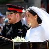 Le prince Harry, duc de Sussex, et Meghan Markle, duchesse de Sussex, en calèche au château de Windsor après la cérémonie de leur mariage au château de Windsor, Royaume Uni, le 19 mai 2018.