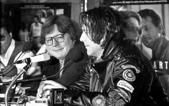 Alan Parker et Mickey Rourke en promotion du film Angel Heart à Paris en 1987.