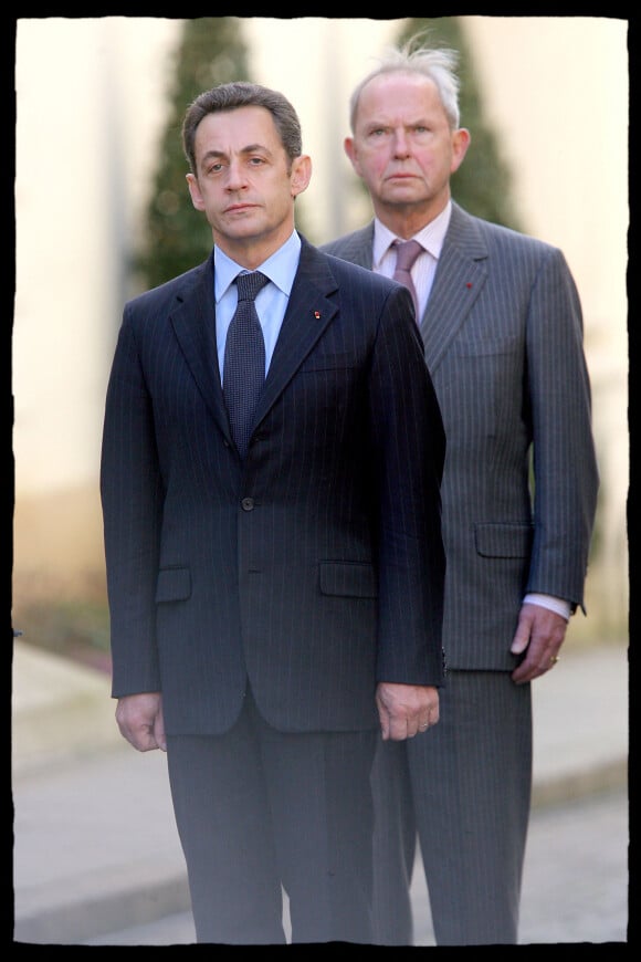 Nicolas Sarkozy et Antoine Rufenacht lors de la cérémonie en hommage au préfet Claude Erignac place Beavau, à Paris, pour les 10 ans de sa mort.