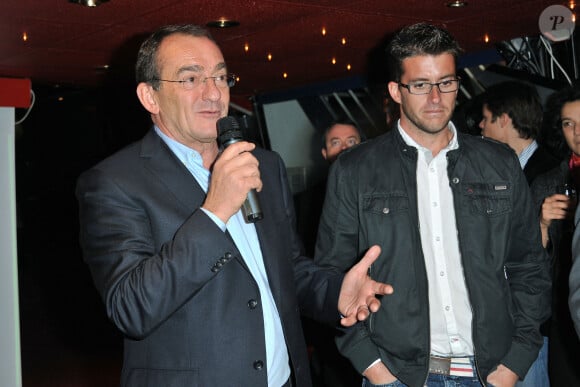 Archives - Jean-Pierre et son fils Olivier Pernaut au trophée Andros 2011 à Paris.