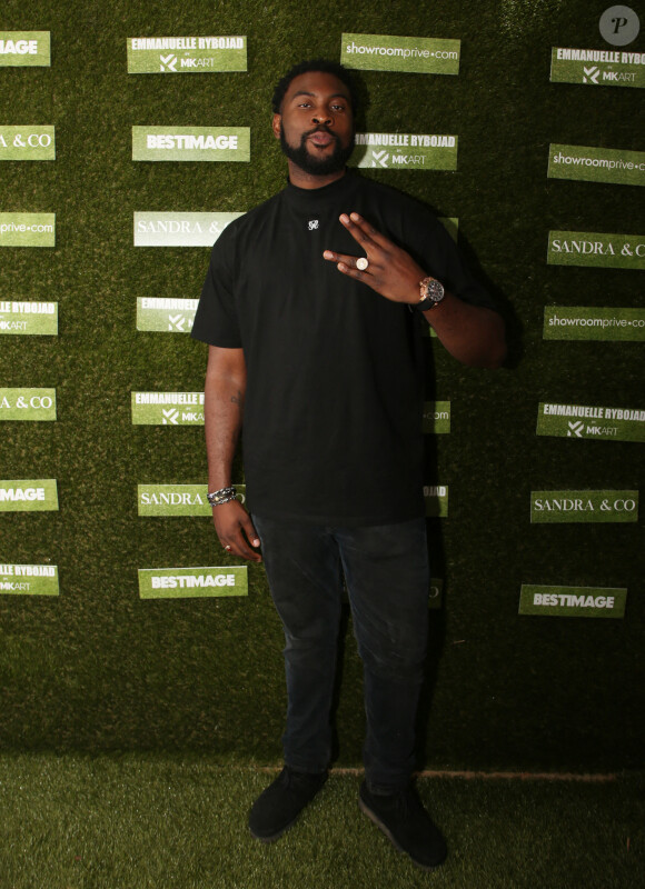 Exclusif - Damso (rappeur) lors de la soirée "Sandra and Co" pendant le 70ème Festival International du film de Cannes, France, le 22 mai 2017. L'équipe du film Hostile avec G. Fitoussi était présente pour un cocktail organisé en son honneur. On a pu croiser plusieurs personnalités du monde du cinéma: L. Azuelos, T. Sisley, le réalisateur S. de freitas, J. Jean-Louis... Dj Noyz, frère de K. dams, discutait musique avec S. Thoen et le rappeur Damso pendant que le footballeur A. Rami discutait art avec la jeune artiste exposée à La Suite Sandra and co E. Rybojad. L. Cholewa et F. Beigbeder ont discuté cinéma sur la terrasse. La Suite Sandra and co ré-ouvrira demain avec un press junket du film Frost de S. Bartas. © Denis Guignebourg/Bestimage