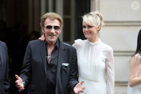 Johnny Hallyday et sa femme Laeticia - Sorties du défilé de mode Haute-Couture automne-hiver 2016/2017 "Christian Dior" à Paris. Le 4 juillet 2016 © CVS-Veeren / Bestimage