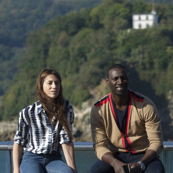 Charlotte Gainsbourg et Omar Sy - Photocall du film "Samba" lors du 62e festival du film de San Sebastian. Le 27 septembre 2014.