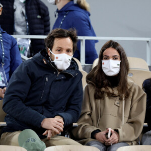 Vianney Bureau et sa compagne Catherine Robert en tribune lors des internationaux de tennis de Roland Garros à Paris le 4 octobre 2020. © Dominique Jacovides / Bestimage 