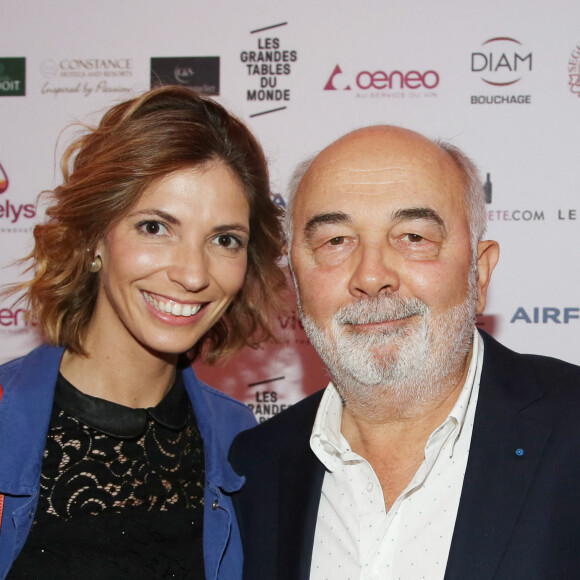 Exclusif - Gérard Jugnot et sa compagne Patricia Campi à la 1ère édition des "Plumes d'Or du Vin et de la Gastronomie" au Pavillon Vendôme à Paris. Le 19 mai 2016.