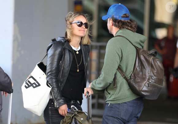 Olivia Wilde et son mari Jason Sudeikis arrivent à l'aéroport de JFK à New York, le 1er octobre 2018 