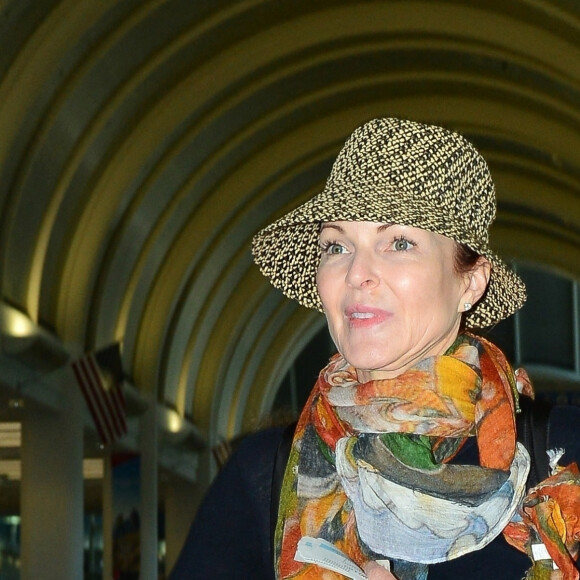 Marcia Cross à l'aéroport LAX de Los Angeles avec ses enfants le 11 juin 2019.