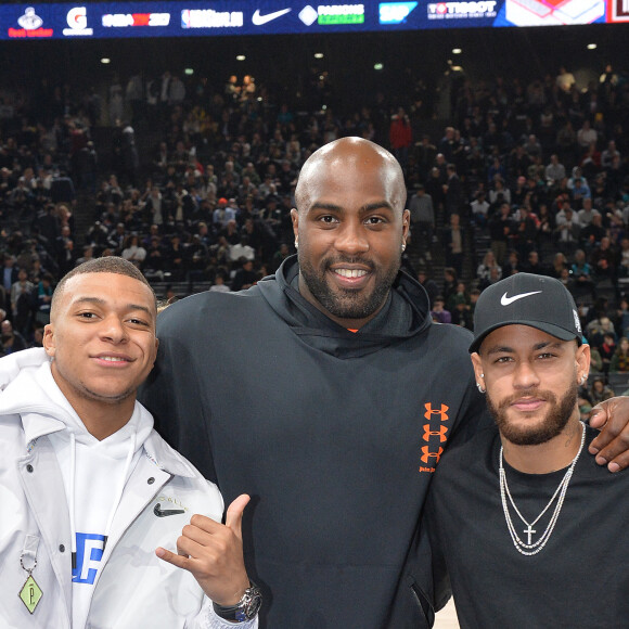 Kylian Mbappé , Teddy Riner et Neymar au match de NBA Game Paris 2020 entre les Bucks de Milwaukee et les Charlotte Hornet à l'AccorHotels Arena à Paris le 24 janvier 2020. © Veeren / Bestimage 