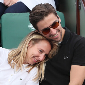 Audrey Lamy et son compagnon Thomas Sabatier dans les tribunes des internationaux de Roland Garros, à Paris, France,. © Cyril Moreau - Dominique Jacovides/Bestimage