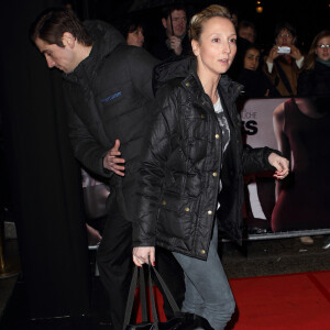 Audrey Lamy et son compagnon Thomas Sabatier à la première du film "Les Infidèles", à Paris en 2012.