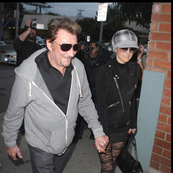 Laeticia Hallyday et son homme Johnny lors d'un voyage à Los Angeles.
