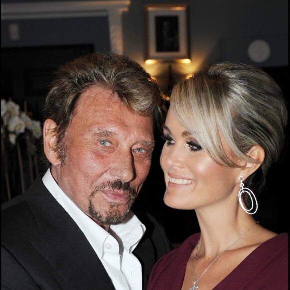 Exclusif- Johnny Hallyday et sa femme lors d'une soirée chez Christian Audigier à Los Angeles.