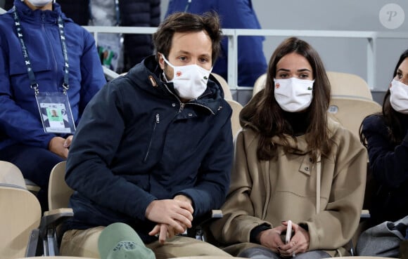 Vianney Bureau et sa compagne Catherine Robert en tribune lors des internationaux de tennis de Roland Garros à Paris le 4 octobre 2020. © Dominique Jacovides / Bestimage 
