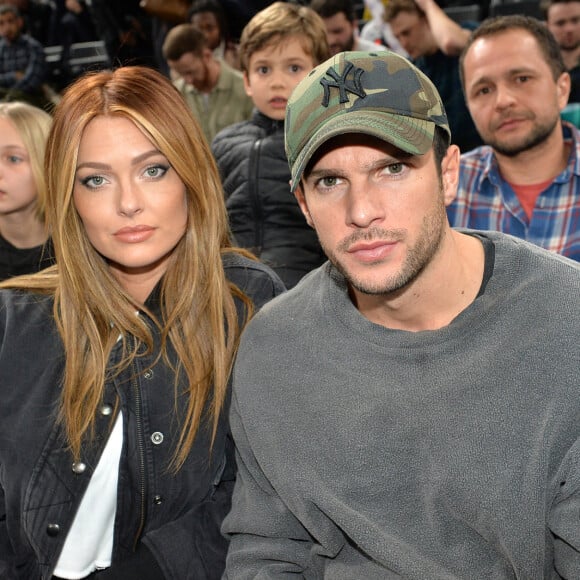 Caroline Receveur et Hugo Philip au match de NBA Game Paris 2020 entre les Bucks de Milwaukee et les Charlotte Hornet à l'AccorHotels Arena à Paris. © Veeren / Bestimage 