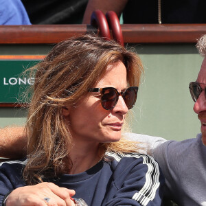 Denis Brogniart et sa femme Hortense dans les tribunes des internationaux de tennis de Roland Garros à Paris, jour 3, le 29 mai 2018. Cyril Moreau / Dominique Jacovides / Bestimage 