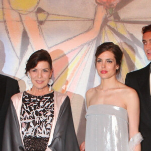 La princesse Charlène de Monaco, le prince Albert II de Monaco, la princesse Caroline de Hanovre, Charlotte Casiraghi, Béatrice Borromeo et son compagnon Pierre Casiraghi, Karl Lagerfeld - Bal de la Rose 2014 au sporting à Monaco, le 29 mars 2014.