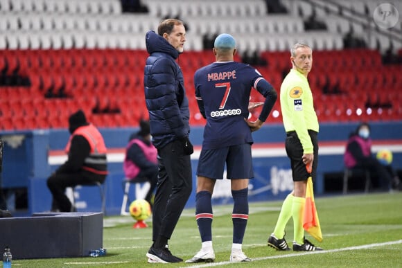 Thomas Tuchel et Kylian Mbappé lors du match de football Paris SG contre Lorient (2-0) en ligue 1 Uber Eats au Parc des Princes à Paris le 16 décembre 2020. © FEP / Panoramic / Bestimage