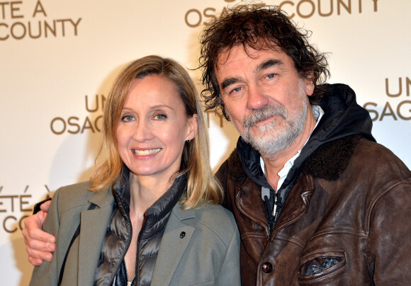Olivier Marchal et sa femme Catherine - Avant-première du film "Un été à Osage County" à l'UGC Normandie à Paris. Le 13 février 2014.