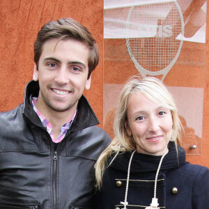 Archives - Audrey Lamy enceinte et son compagnon Thomas Sabatier lors des internationaux de tennis de France de Roland Garros à Paris, le 30 mai 2010.