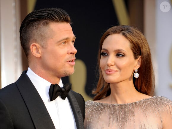Brad Pitt et Angelina Jolie - 86e cérémonie des Oscars à Hollywood. Le 2 mars 2014.