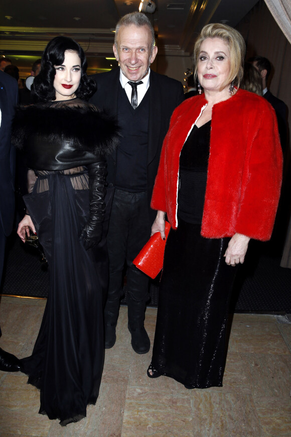 Dita Von Teese, Jean Paul Gaultier, Catherine Deneuve - Diner de la mode pour le Sidaction au Pavillon d'Armenonville a Paris, le 23 janvier 2014.