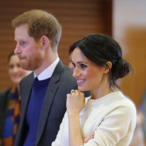 Le prince Harry et Meghan Markle visitent la Titanic FX Company à Belfast et rencontrent de jeunes entrpreneurs le 23 mars 2018.