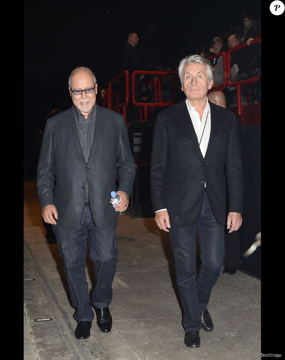 René Angélil et Gilbert Coullier au concert de Céline Dion au POPB de Paris, le 29 novembre 2013.