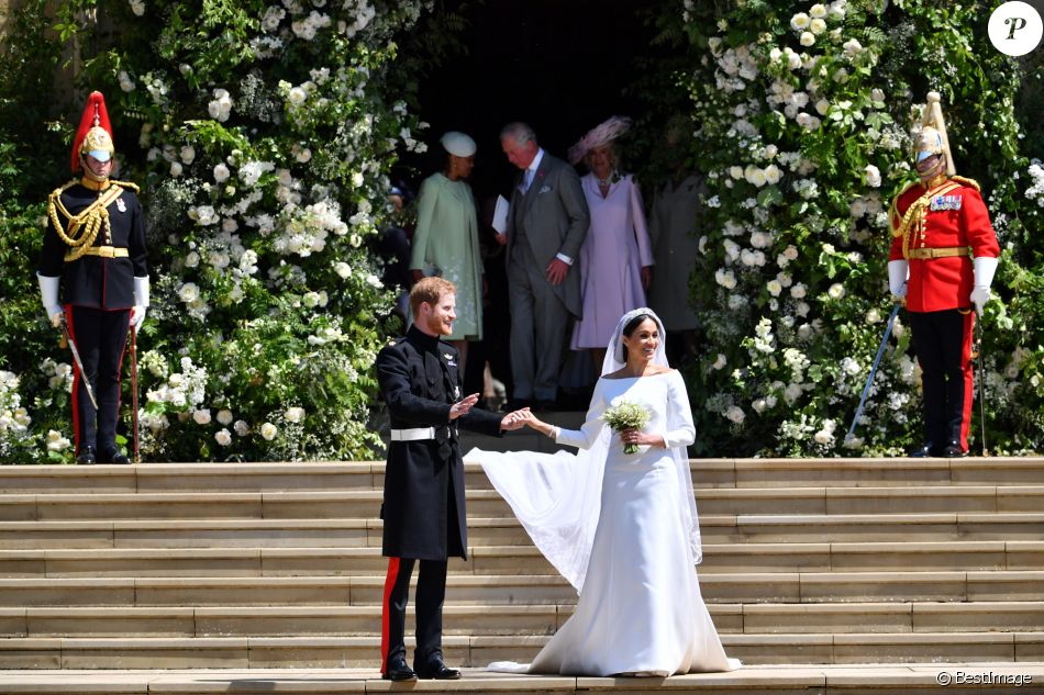 Le prince Harry, duc de Sussex, et Meghan Markle, duchesse de Sussex, à la sortie de chapelle St. George au château de Windsor - Sortie après la cérémonie de mariage du prince Harry et de Meghan Markle en la chapelle Saint-George au château de Windsor, Royaume Uni, le 19 mai 2018.