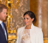 Le prince Harry, duc de Sussex, et Meghan Markle (enceinte), duchesse de Sussex - La famille royale d'Angleterre lors de la réception pour les 50 ans de l'investiture du prince de Galles au palais Buckingham à Londres. Le 5 mars 2019