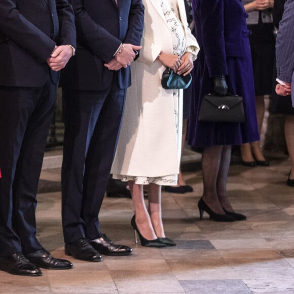 Kate Middleton, duchesse de Cambridge, le prince William, duc de Cambridge, le prince Harry, duc de Sussex, Meghan Markle, enceinte, duchesse de Sussex, lors de la messe en l'honneur de la journée du Commonwealth à l'abbaye de Westminster à Londres le 11 mars 2019.
