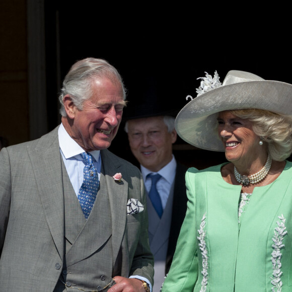 Le prince Charles, prince de Galles, Camilla Parker Bowles, duchesse de Cornouailles, Meghan Markle, duchesse de Sussex lors de la garden party pour les 70 ans du prince Charles au palais de Buckingham à Londres. Le 22 mai 2018