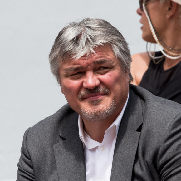 David Douillet et sa femme Vanessa Carrara dans les tribunes des Internationaux de France de Tennis de Roland Garros 2019 à Paris. Le 29 mai 2019. © Jacovides-Moreau/Bestimage