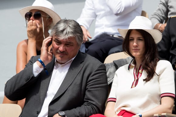 David Douillet et sa femme Vanessa Carrara dans les tribunes des Internationaux de France de Tennis de Roland Garros 2019 à Paris. Le 29 mai 2019. © Jacovides-Moreau/Bestimage