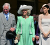 Camilla Parker Bowles, duchesse de Cornouailles, et Meghan Markle, duchesse de Sussex, lors de la garden party pour les 70 ans du prince Charles au palais de Buckingham à Londres. Le 22 mai 2018 