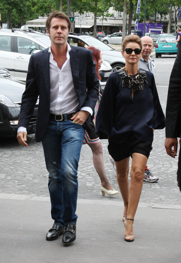 Le prince Emmanuel Philibert de Savoie et son epouse Clotilde Courau - People arrivant au defile Haute-Couture Automne-Hiver 2013/2014 "Armani Prive" au Palais de Chaillot a Paris, le 2 juillet 2013.