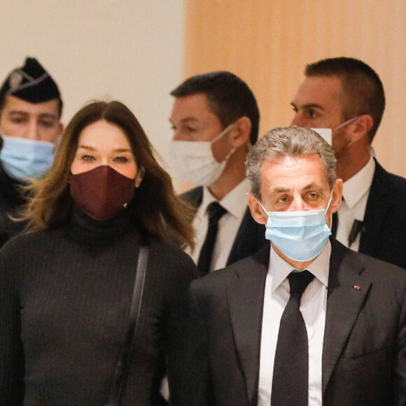 1er jour des plaidoiries de la défense - Nicolas Sarkozy arrive avec sa femme Carla Bruni Sarkozy procès des "écoutes téléphoniques" (affaire Paul Bismuth) au tribunal de Paris le 9 décembre 2020. © Christophe Clovis / Bestimage