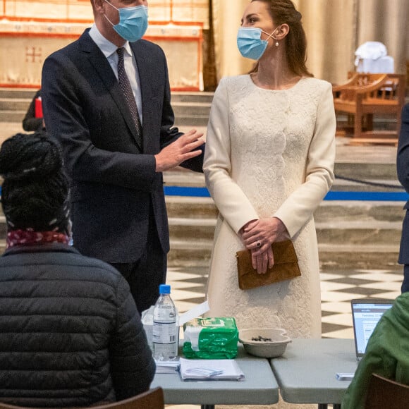 Le prince William et Kate Middleton, lors d'une visite au centre de vaccination de l'abbaye de Westminster à Londres, Royaume Uni, le 23 mars 2021. 