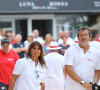 Jean-Luc Reichmann et sa femme Nathalie lors du trophée de pétanque "Sénéquier 209" sur la place des Lices à Saint-Tropez, Côte d'Azur, France, le 22 août 2019.