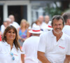 Jean-Luc Reichmann et sa femme Nathalie lors du trophée de pétanque "Sénéquier 209" sur la place des Lices à Saint-Tropez, Côte d'Azur, France, le 22 août 2019.