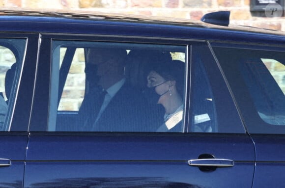 Le prince William, duc de Cambridge, et Catherine (Kate) Middleton, duchesse de Cambridge, arrivent aux funérailles du prince Philip, duc d'Edimbourg à la chapelle Saint-Georges du château de Windsor, Royaume Uni, le 17 avril 2021.