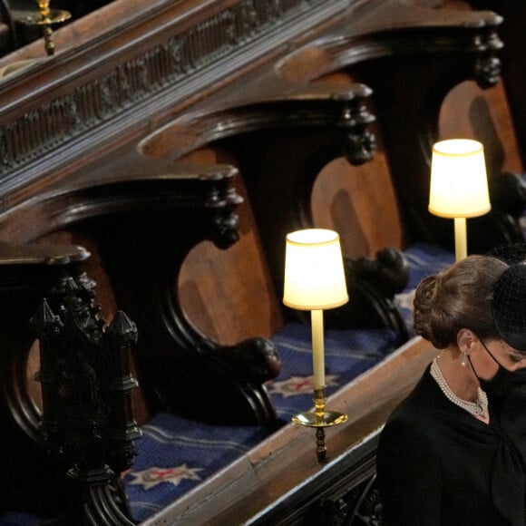 Le prince William, duc de Cambridge, et Catherine (Kate) Middleton, duchesse de Cambridge, - Funérailles du prince Philip, duc d'Edimbourg à la chapelle Saint-Georges du château de Windsor, Royaume Uni, le 17 avril 2021.