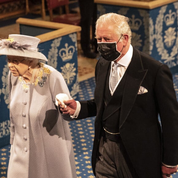 La reine Elisabeth II d'Angleterre et le prince Charles, prince de Galles - La reine d'Angleterre va prononcer son discours d'ouverture de la session parlementaire à la Chambre des lords au palais de Westminster à Londres, Royaume Uni, le 11 mai 2021.