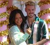 Christina Milian, et son compagnon M Pokora sur un char lors d'une parade à Los Angeles