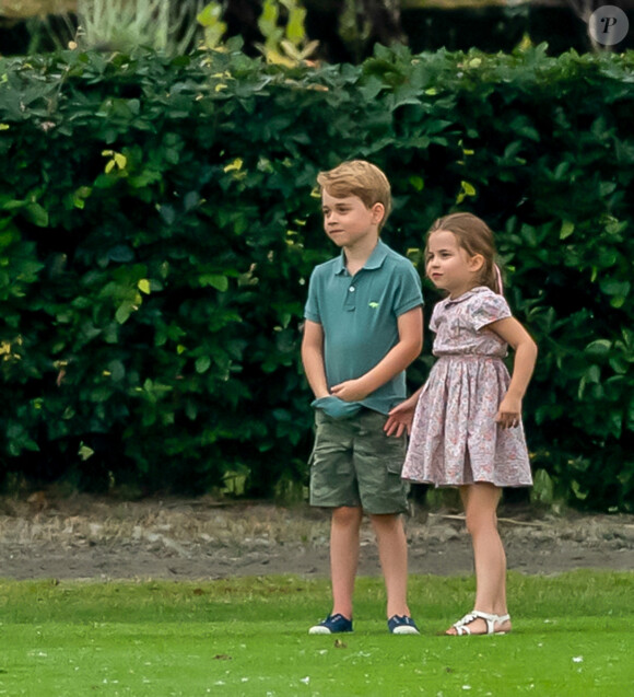 Le prince George de Cambridge et sa soeur la princesse Charlotte de Cambridge lors d'un match de polo à Wokinghan, comté de Berkshire, Royaume Uni. Le 10 juillet 2019.
