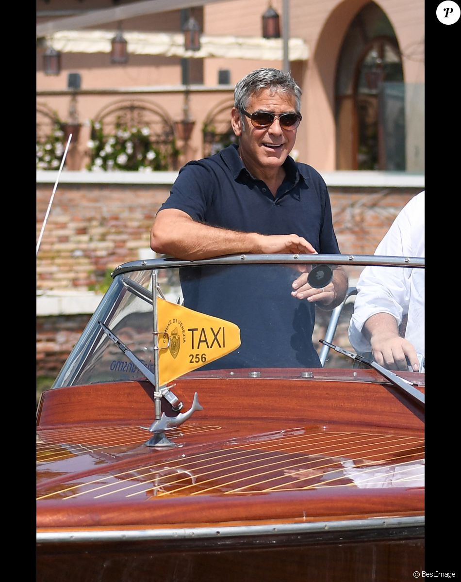 George Clooney et sa femme Amal Clooney sortent de leur hôtel, et prennent un bateau taxi pour se rendre dans un héliport pour s'envoler en hélicoptère de Venise, Italie, le 27 juin 2019.