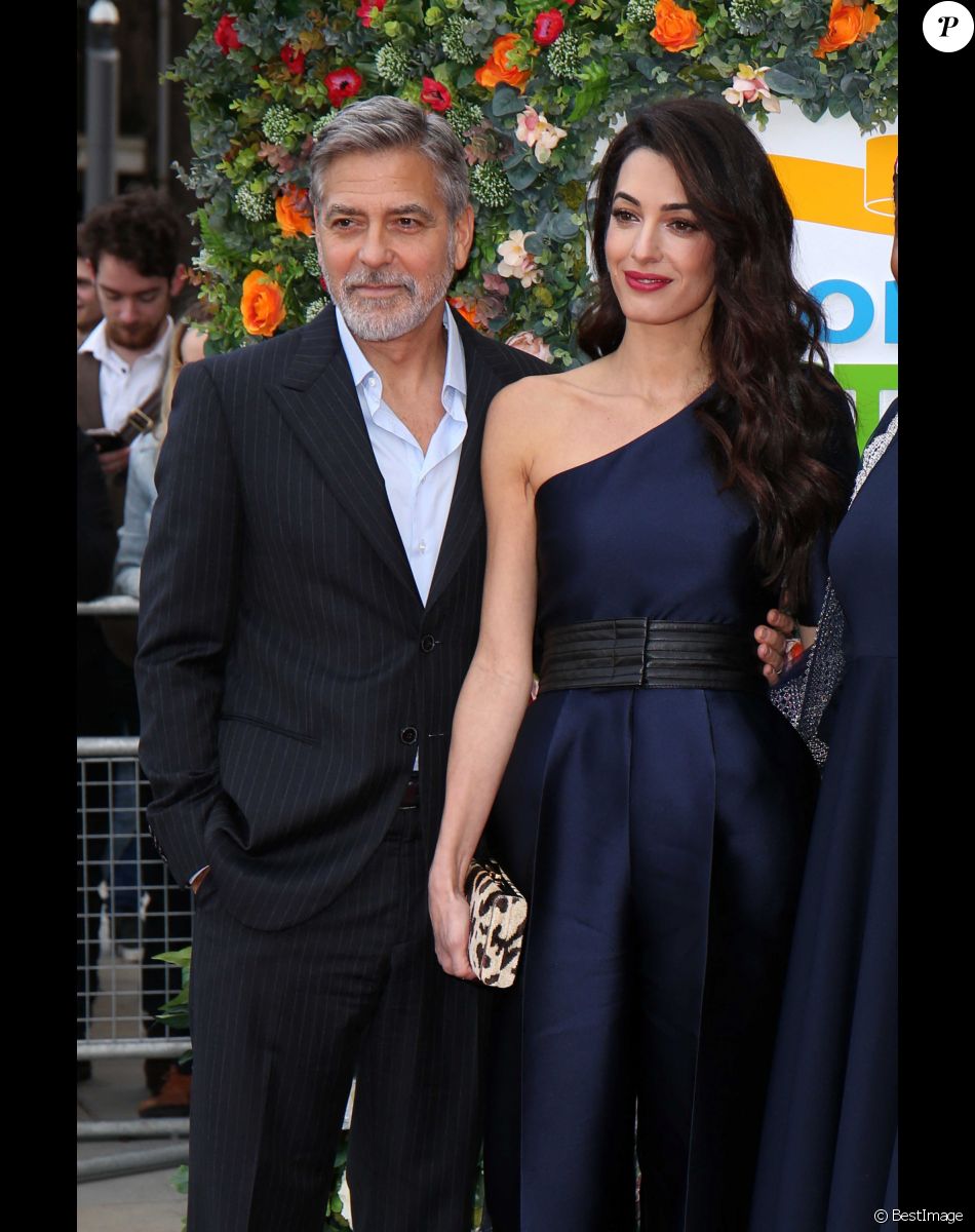 La grande avocate Amal Alamuddin et son mari à l'événement "Postcode Lottery Charity Gala" au McEwan hall à Edimbourg.